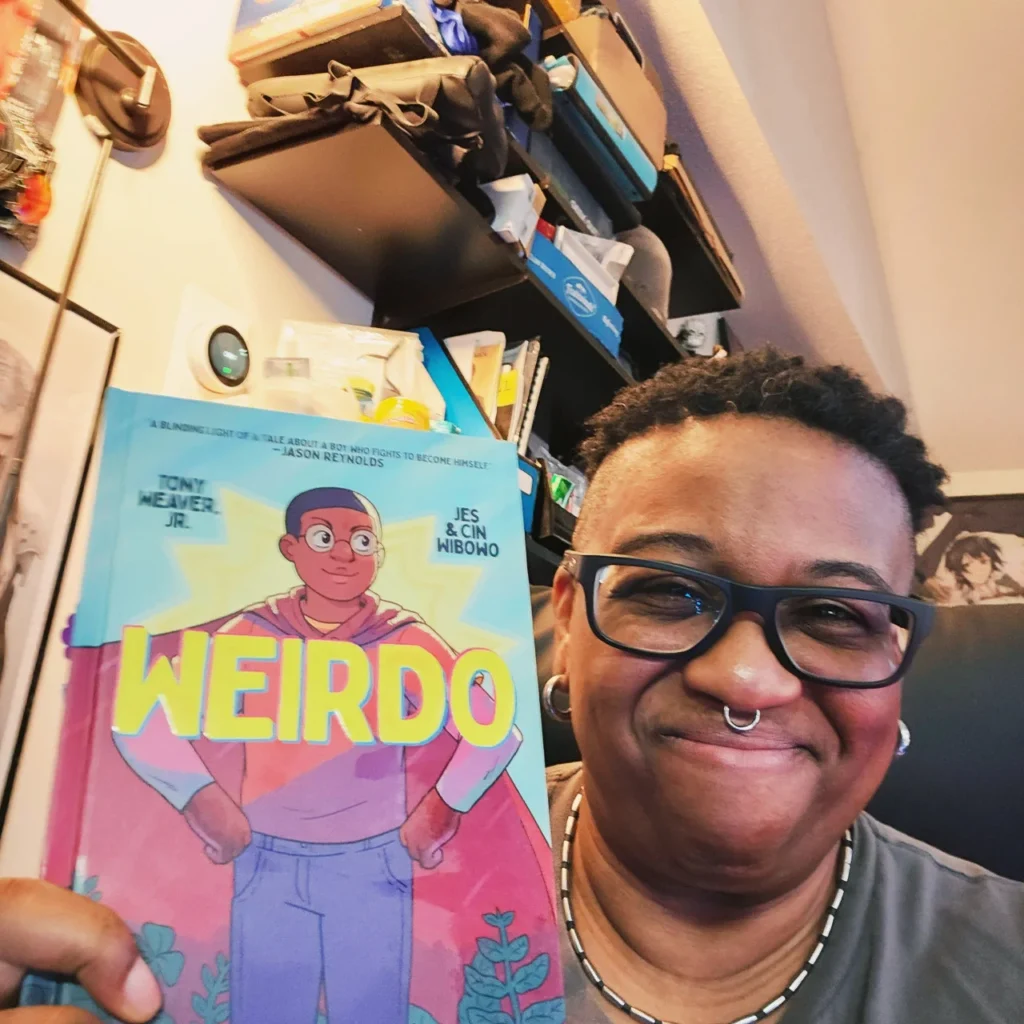 Me with Tony Weaver Jr's book, "Weirdo"